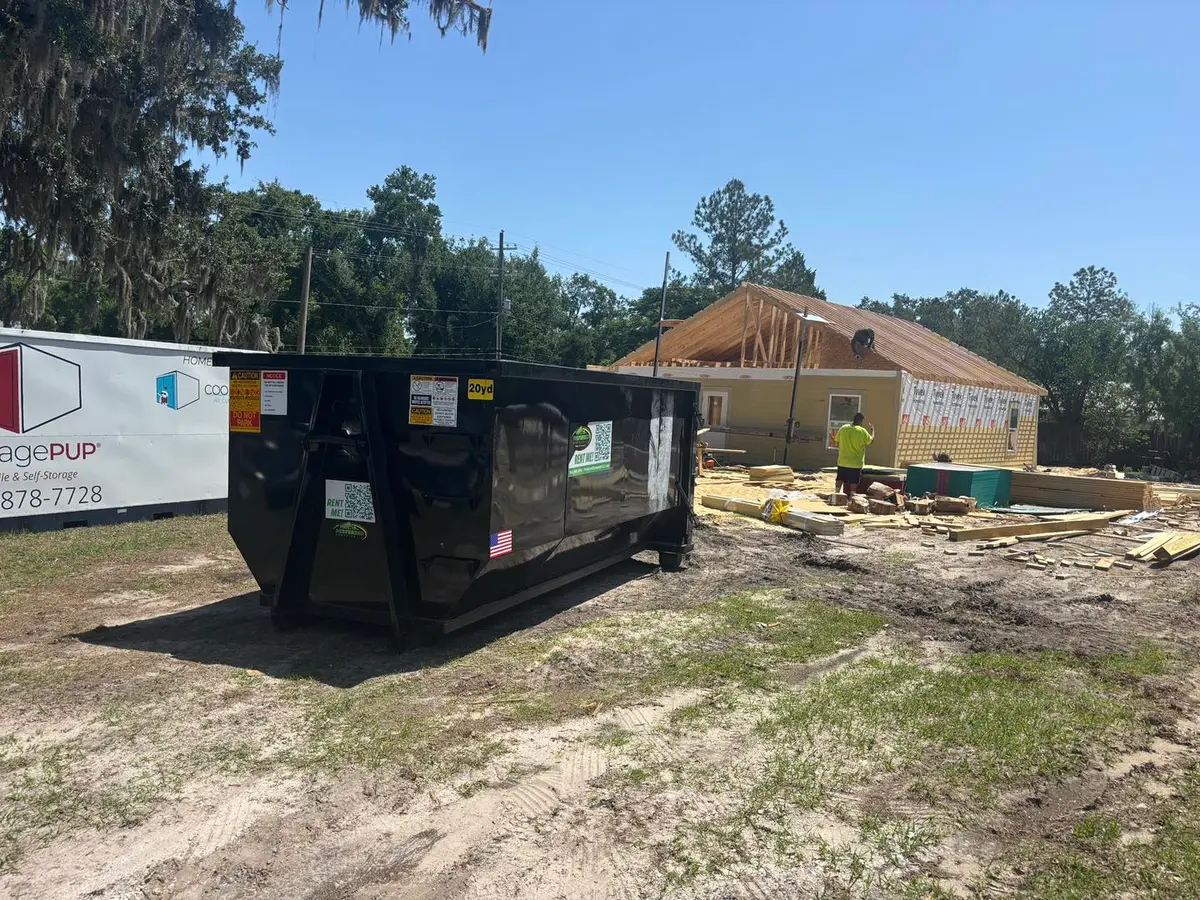 Preferred Dumpster roll-off container on a construction site in Polk County